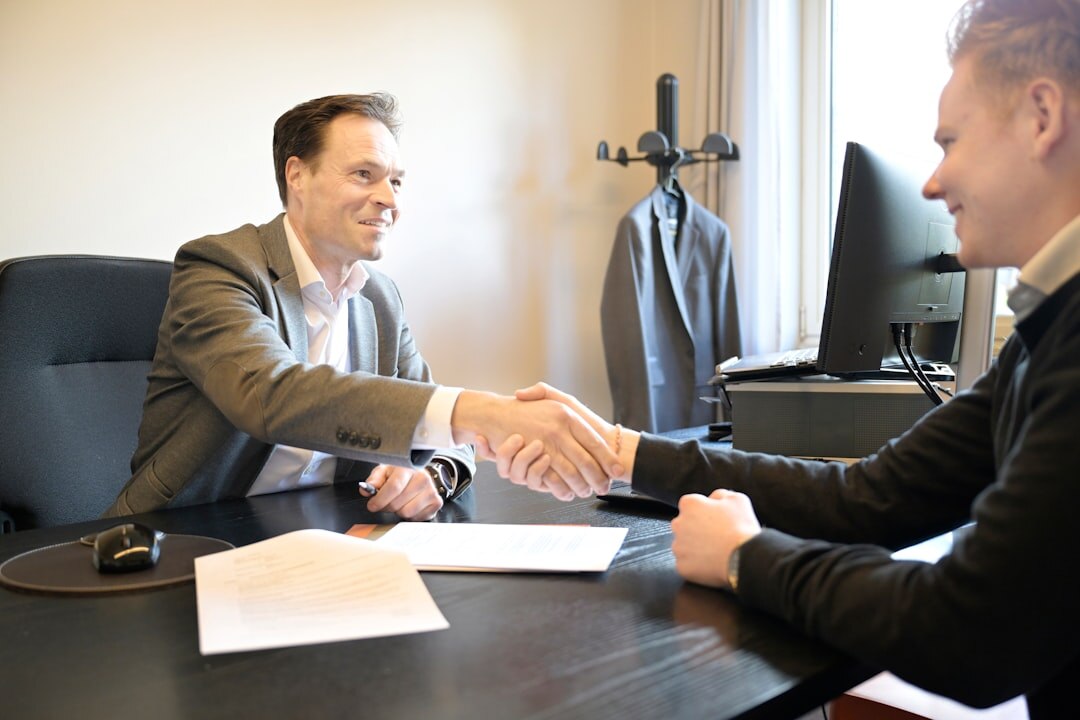 business handshake in office